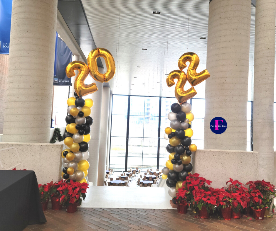 Two columns of balloons with the numbers 20 and 22 on them
