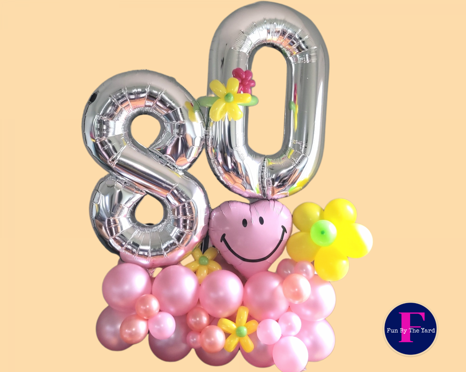 A bunch of balloons with the number 80 on top
