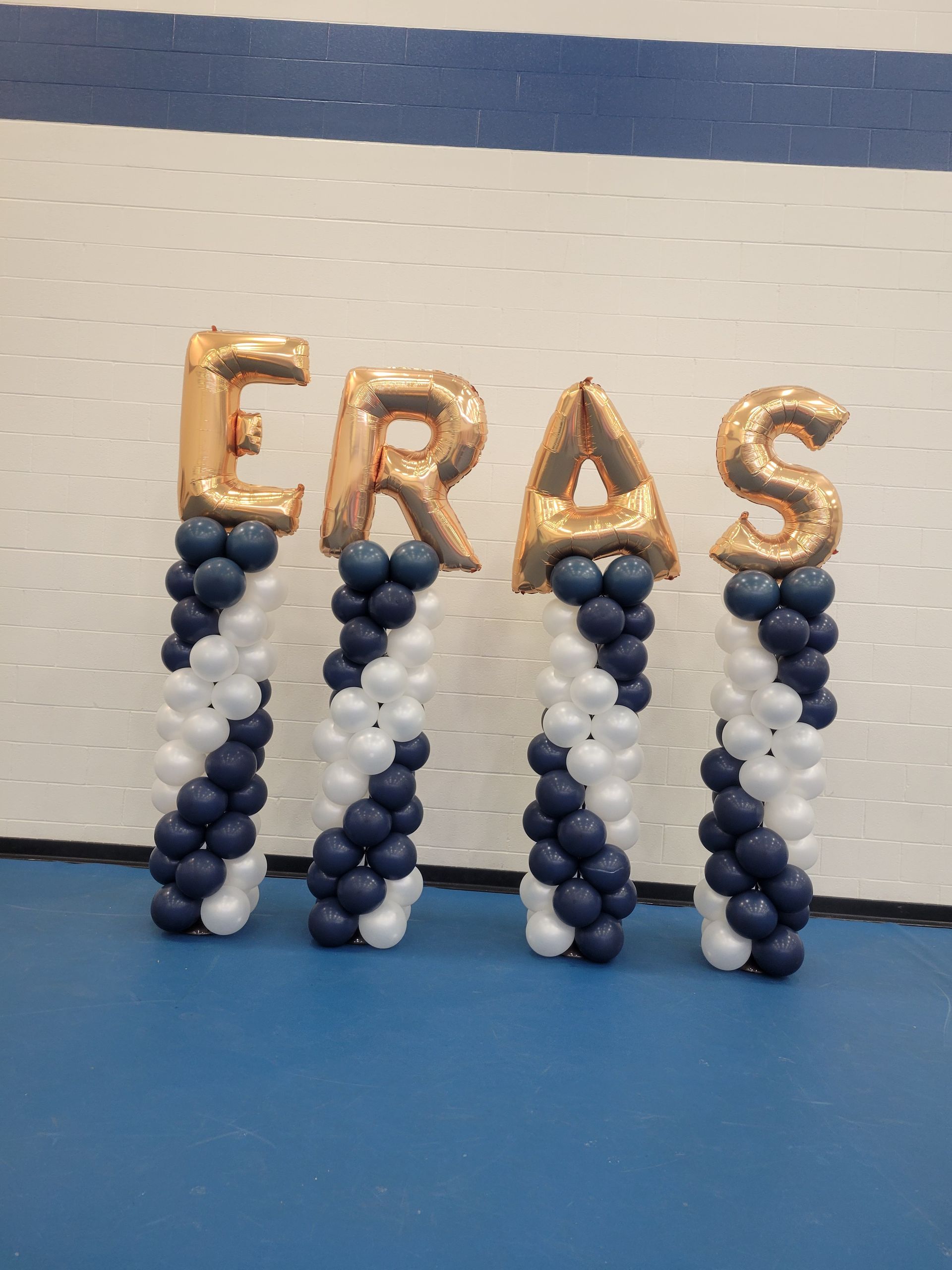 Gold balloons spelling