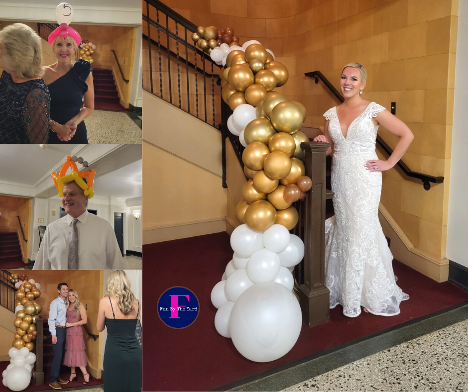 A woman in a wedding dress is standing in front of a staircase decorated with gold and white balloons