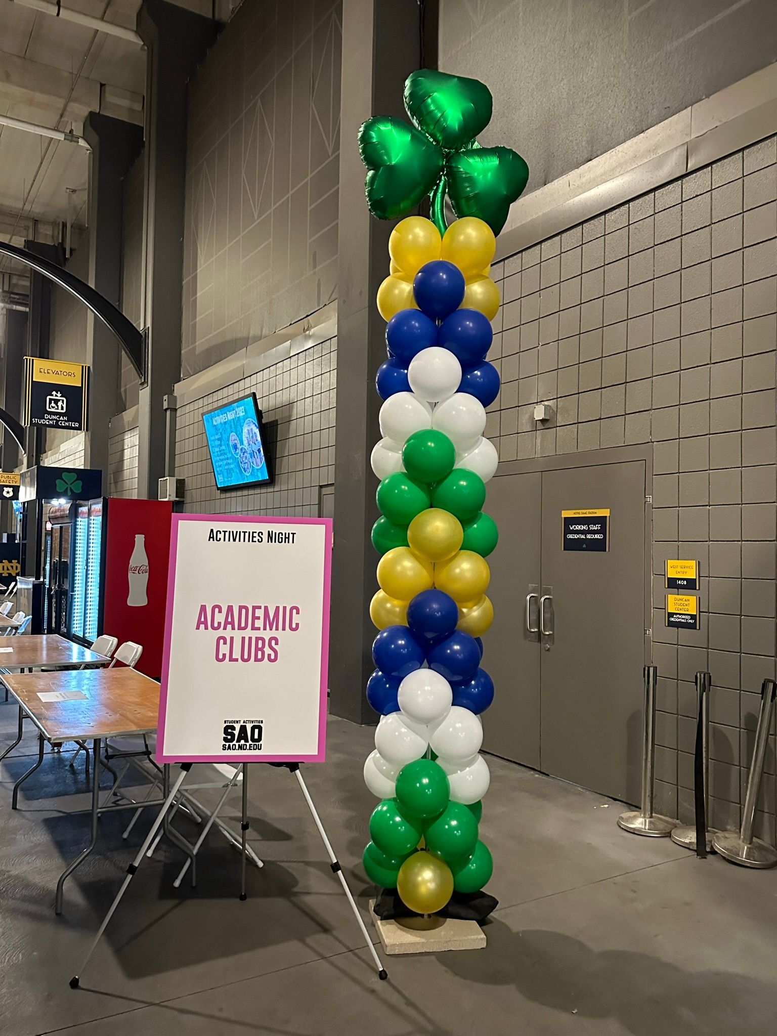 a balloon display with a sign that says academic clots