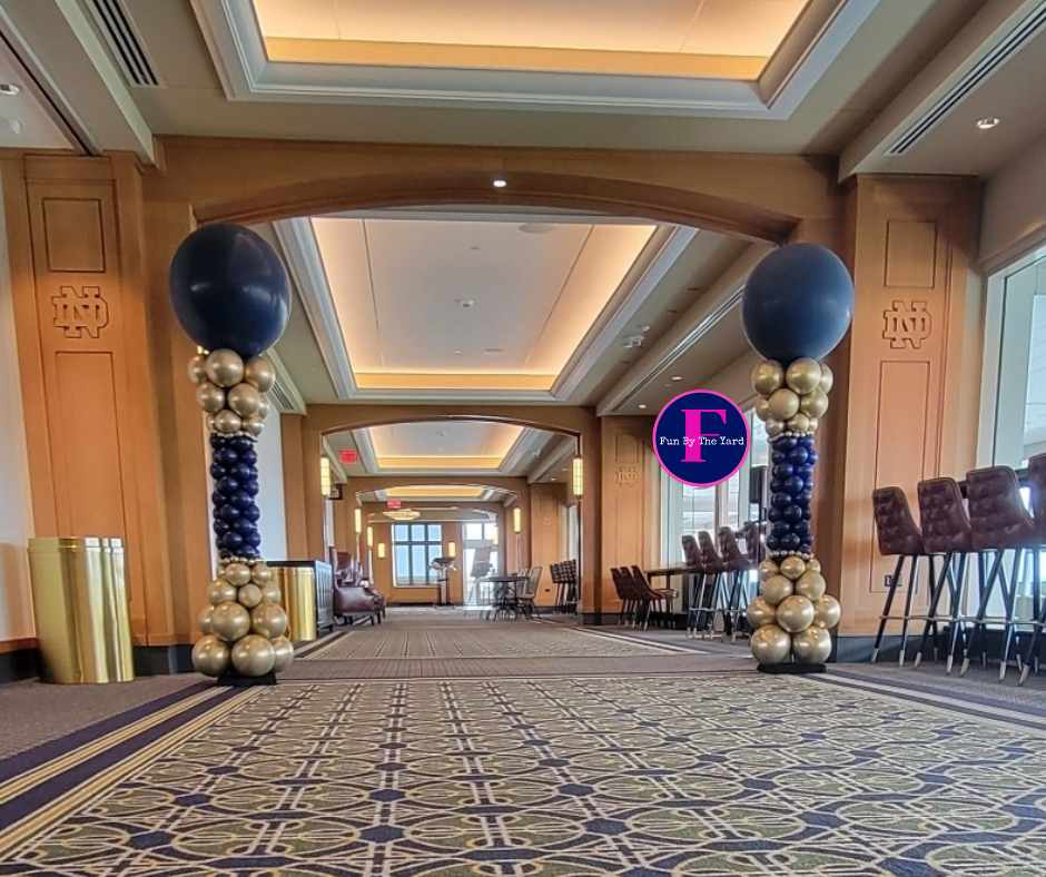 A hallway with empire style balloon columns