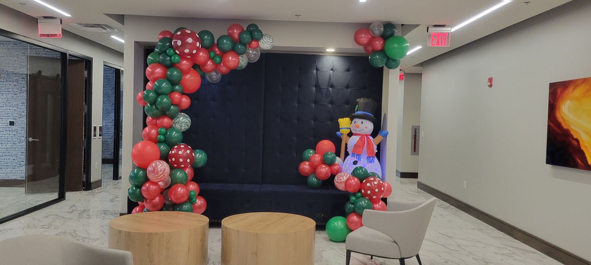 Organic demi arch made out of balloons for Christmas