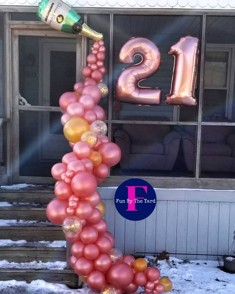 Organic balloon garland in pink with the number 21 for a birthday