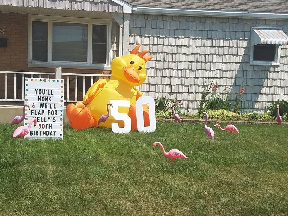 An inflatable duck with the number 50 on it