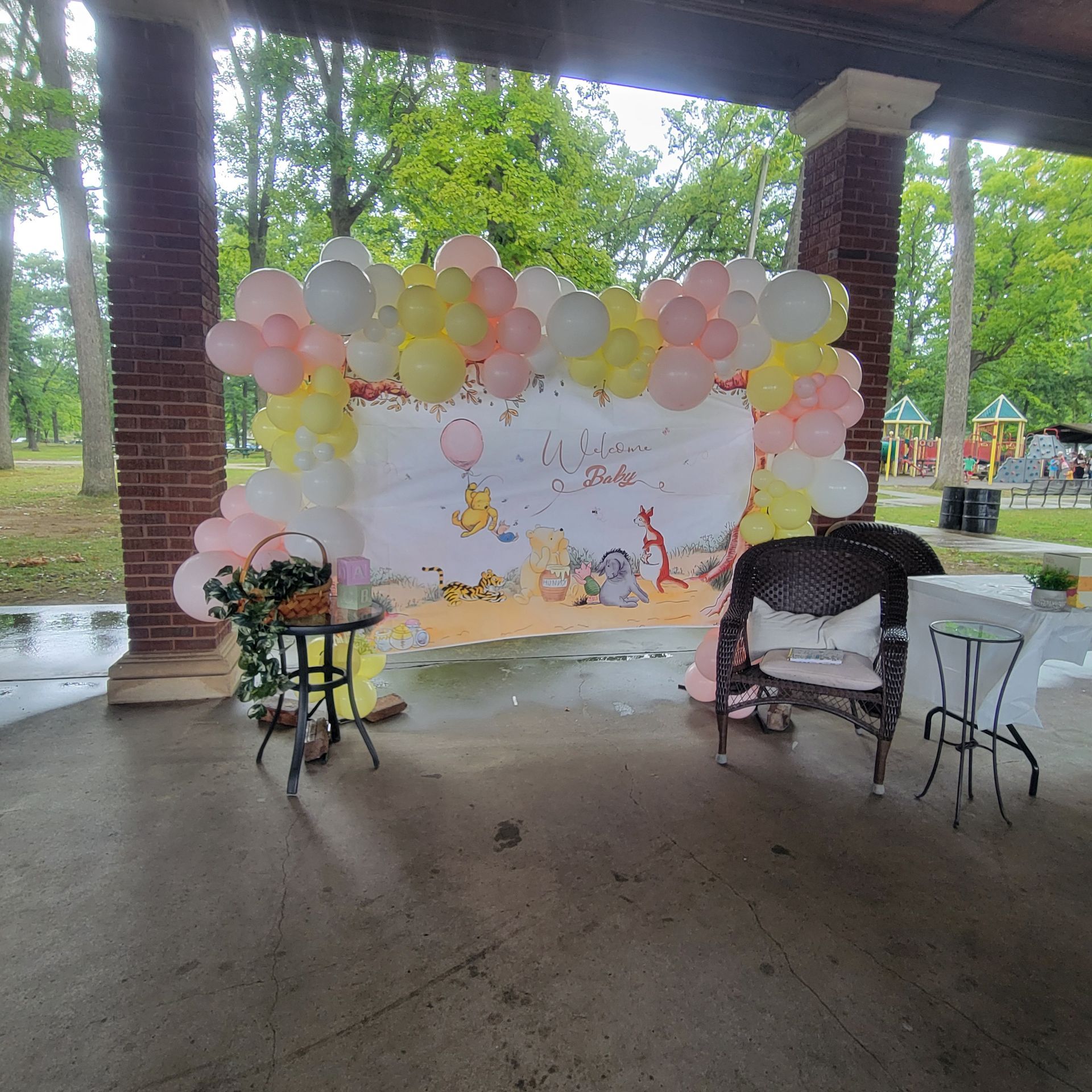 Winnie the Pooh baby shower with organic balloon backdrop