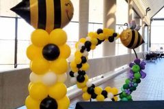 Bee themed balloon decor