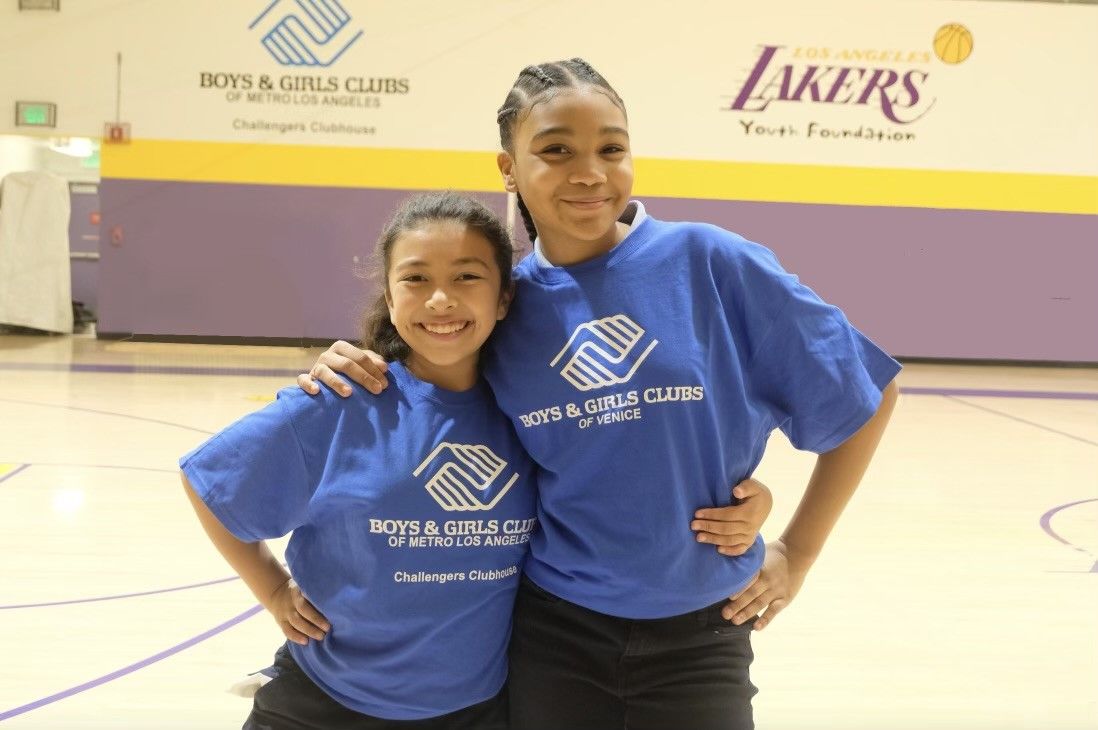 Picture of two girls wearing BGCMLA shirts