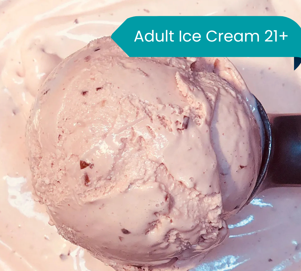 A close up of a scoop of ice cream on a plate.