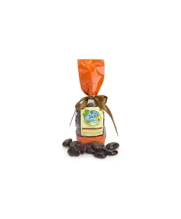A bag of chocolate covered almonds is sitting on top of a pile of chocolate covered almonds.