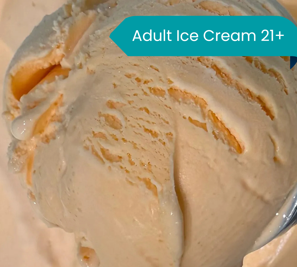 A close up of a scoop of ice cream on a plate