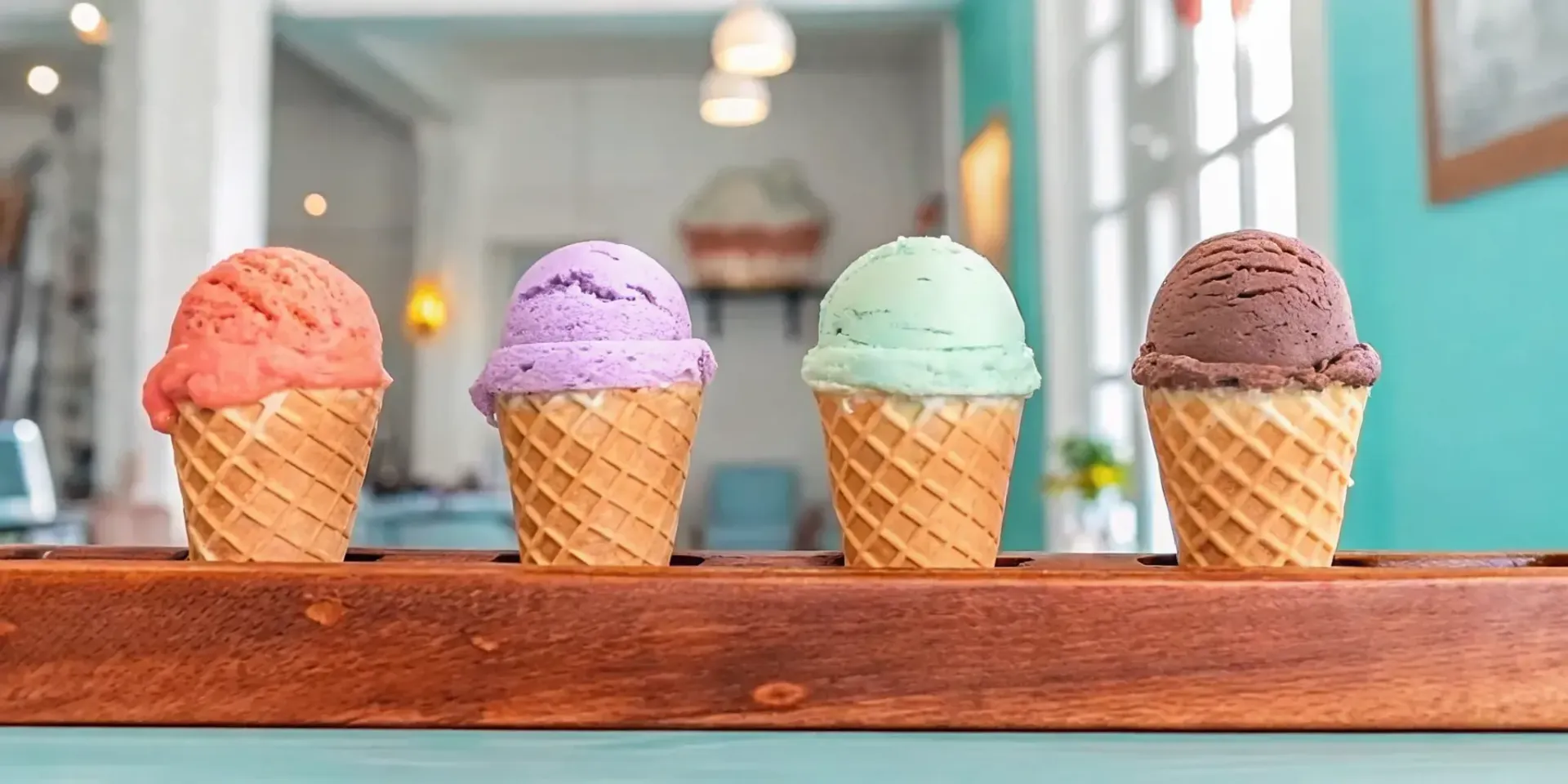 Seasonal ice cream scoops in a waffle cone representing four seasons