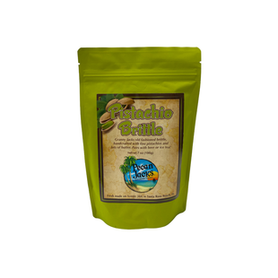 A green bag of pistachio brittle is on a white background