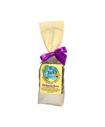 A bag of chocolate covered raisins with a purple bow.