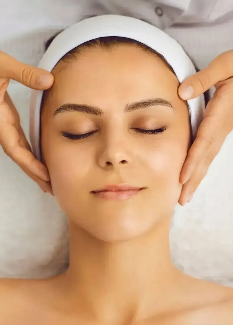 A person is getting a vaccine in their arm.