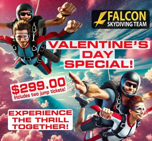 Tandem skydivers in freefall over Kansas City on a clear summer day