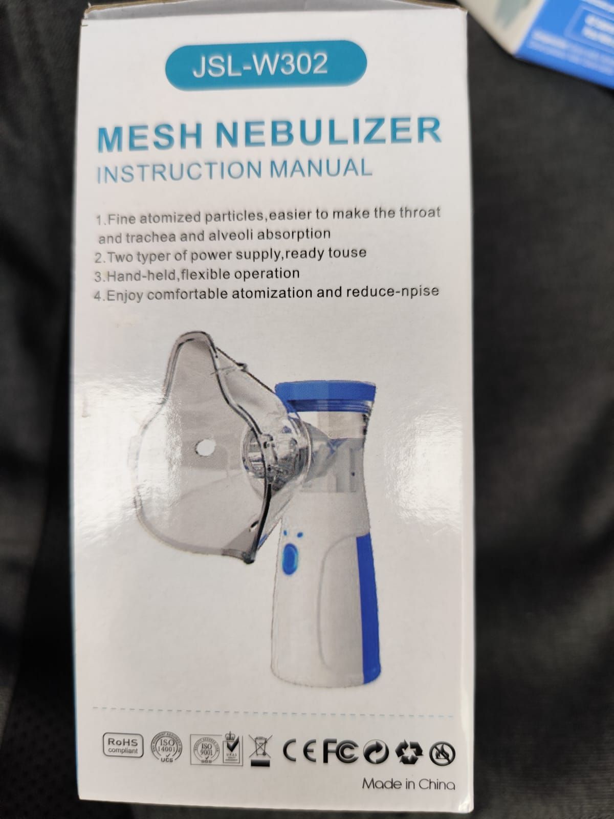 Portada del manual de instrucciones de un nebulizador de malla JSL-W302, que muestra el dispositivo y la mascarilla sobre un fondo blanco.