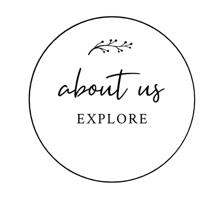 Circular black-and-white button reading “about us” and “EXPLORE” with a small leaf accent.