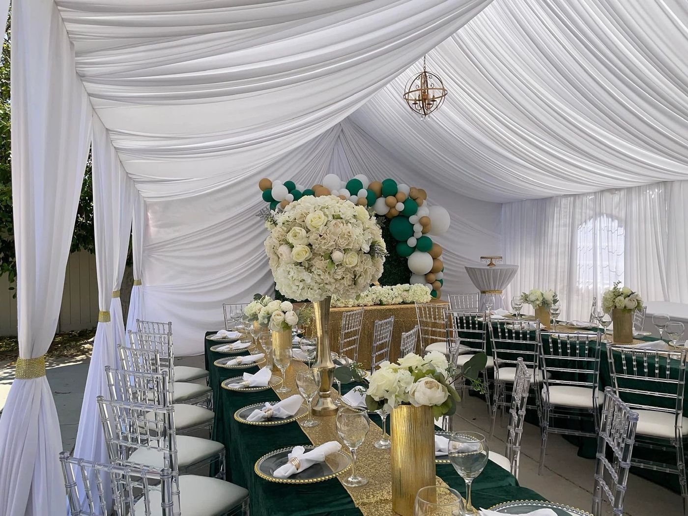 Elegant event setup with white drapery