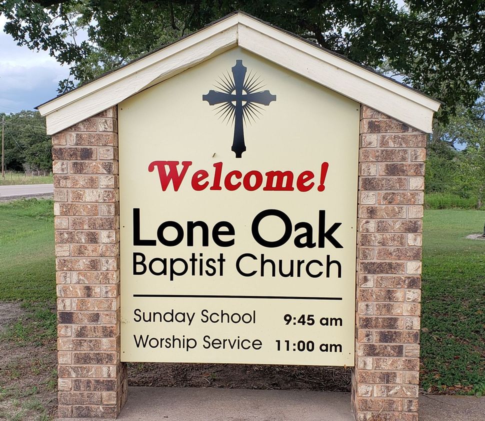 Sign for Lone Oak Baptist Church, with cross, 