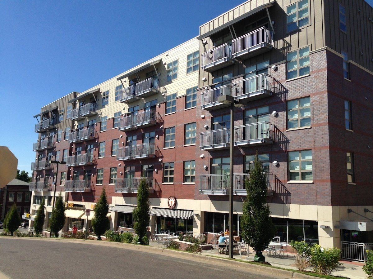 The Lofts of Columbia on 9th Street in Columbia, MO on a sunny summer day.