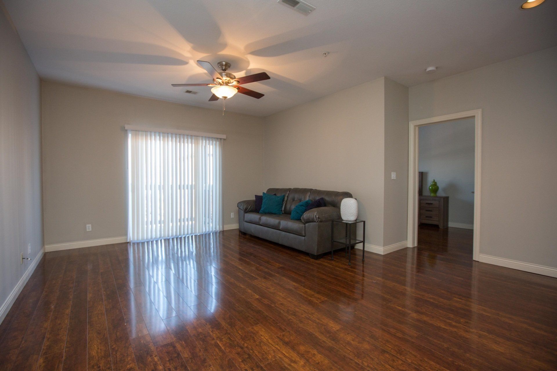 Check Out the Spacious Living Rooms With Hardwood Floors at The Lofts at the Manor in Columbia, MO