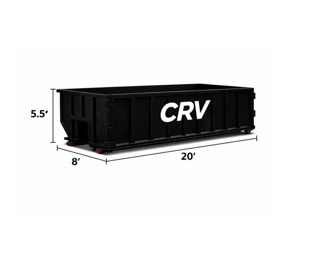 A large, black rectangular dumpster labeled 