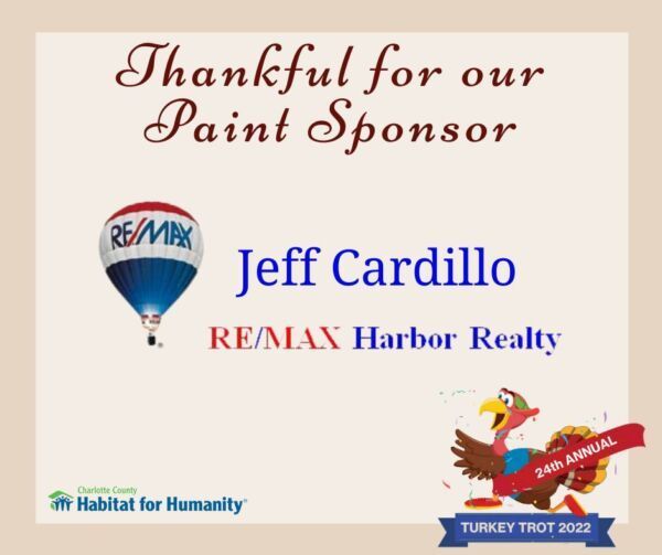 Sign thanking Jeff Cardillo/RE/MAX Harbor Realty for sponsoring the Turkey Trot for Habitat for Humanity. Includes a hot air balloon logo, and a cartoon turkey running with a banner that says 24th Annual Turkey Trot 2022.
