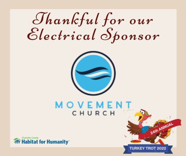 Sign thanking Movement Church for sponsoring Turkey Trot 2022, with logo and cartoon turkey.