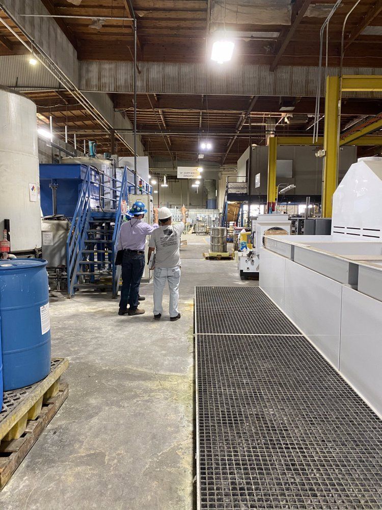 A person is pressing a button on an electrical box.