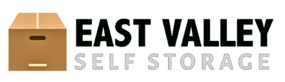 A logo for east valley self storage with a cardboard box