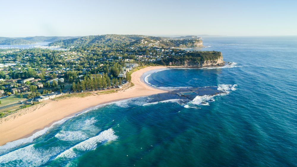 An Aerial View of a Beach in the Middle of the Ocean — Richardson Conveyancing in Sydney, NSW