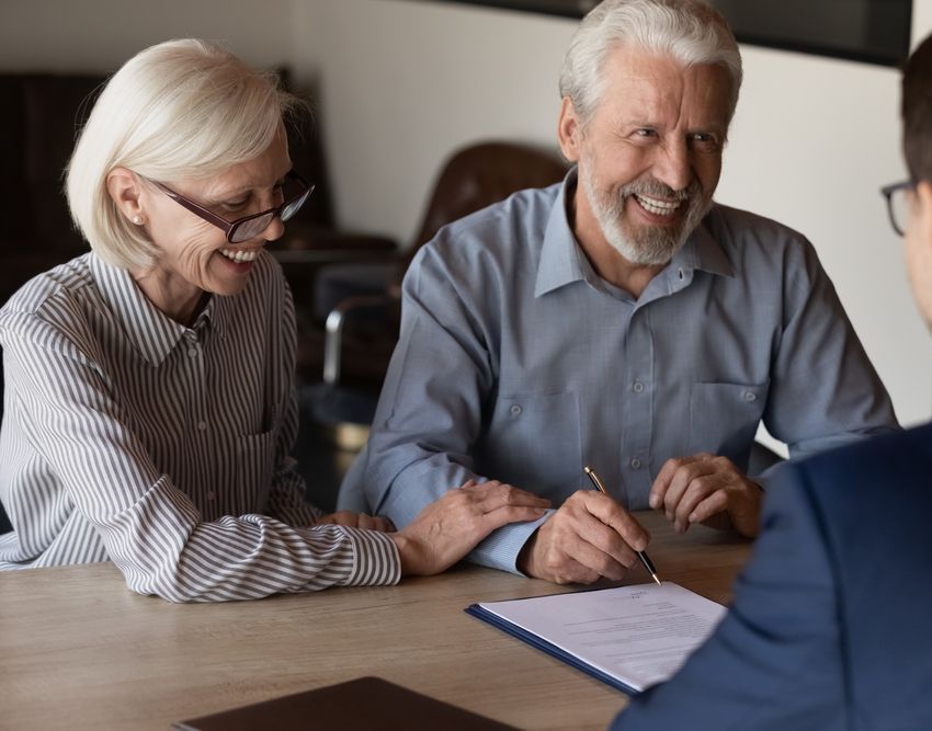 Man Showing Contract to Client — Richardson Conveyancing in Tumbi Umbi, NSW