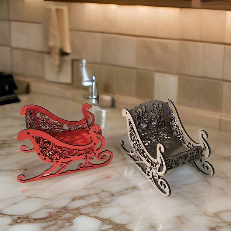 Two wooden sleighs are sitting on a marble counter.