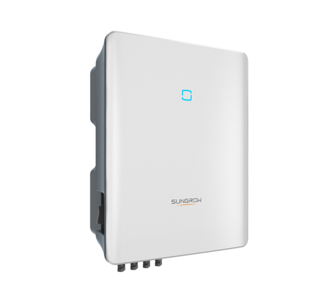 A white solar inverter is sitting on top of a white surface.