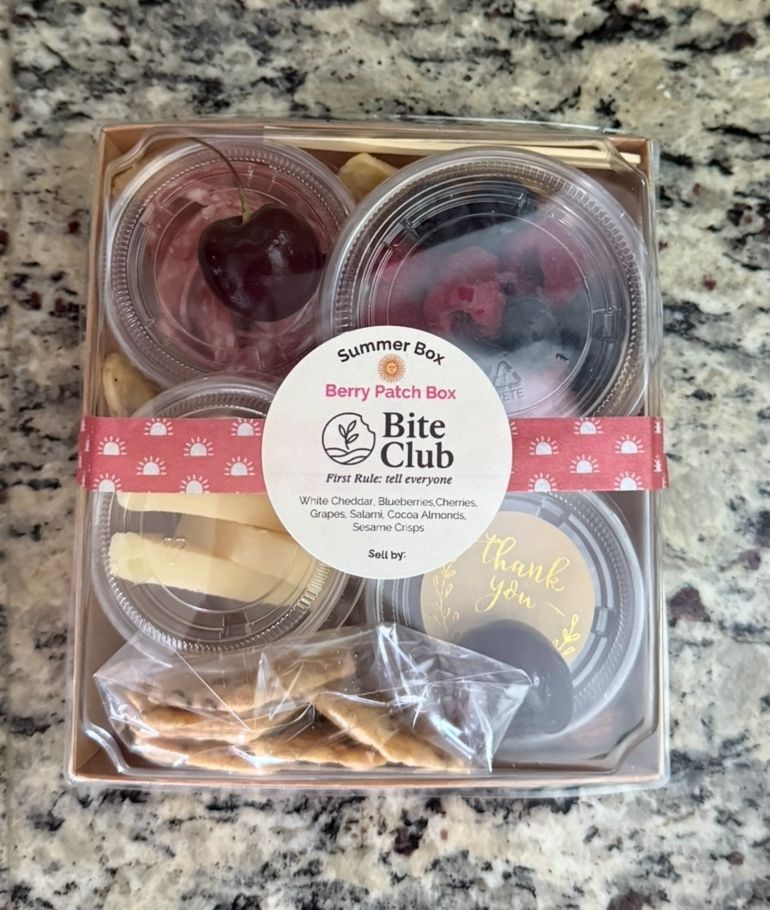 Summer Box Berry Patch Box from Bite Club, with four containers of food and crackers.