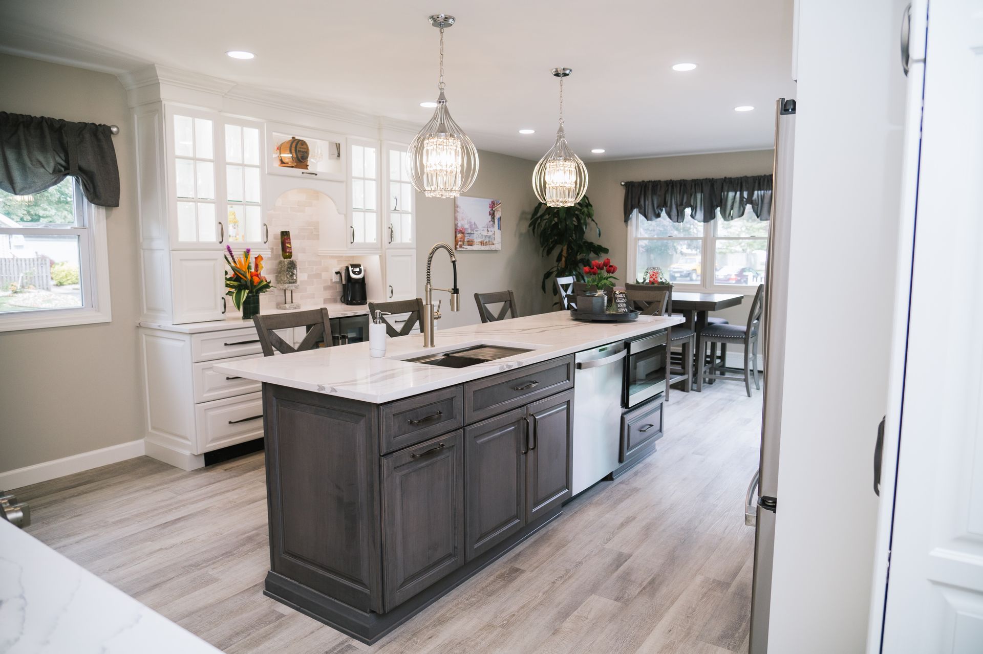 There is a large island in the middle of the kitchen.