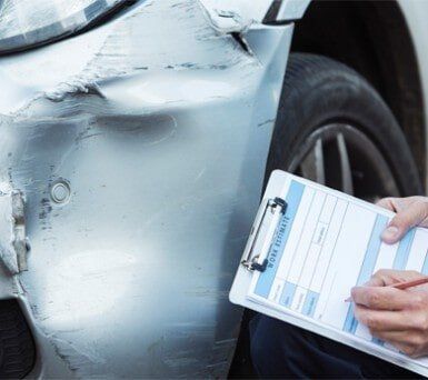 Inspecting Damage To Car — Car Maintenance in Kingsport, TN