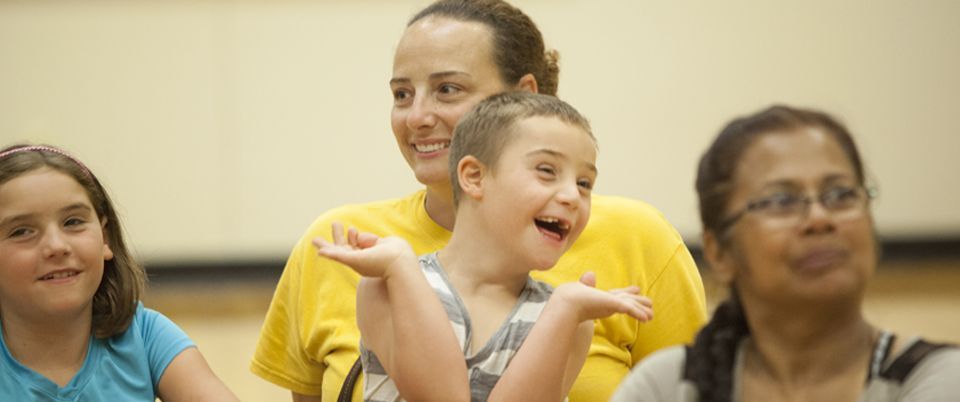 KEEN Athlete with large grin missing two front teeth