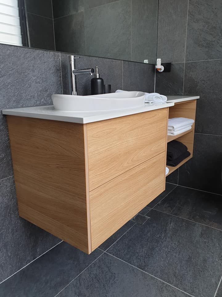 A Bathroom With Two Sinks and a Mirror — Pacific Cabinets In Iluka, NSW