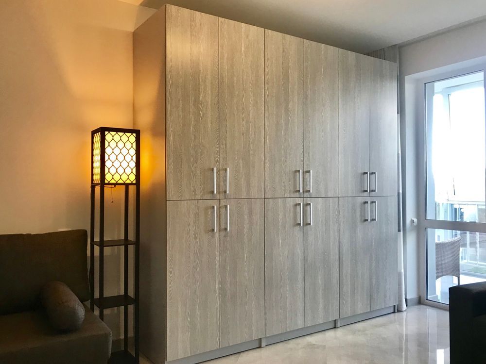 Large gray wooden cabinets in a room — Pacific Cabinets In Yamba, NSW