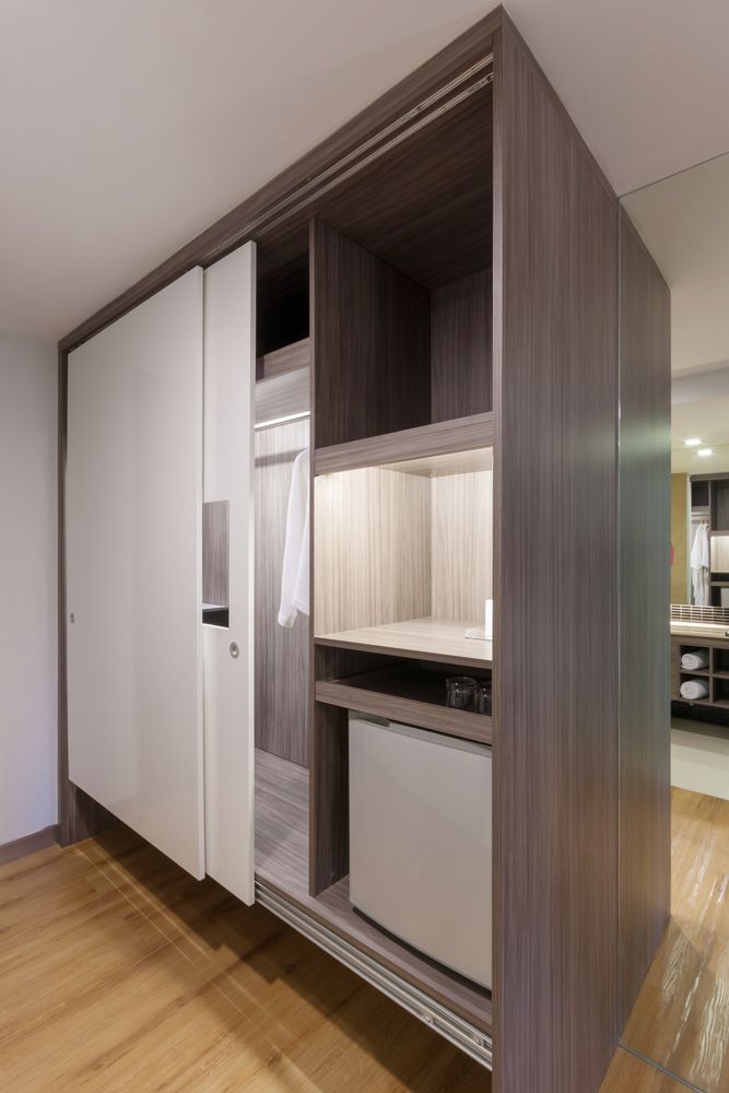 A Closet With Sliding Doors — Pacific Cabinets In Maclean, NSW