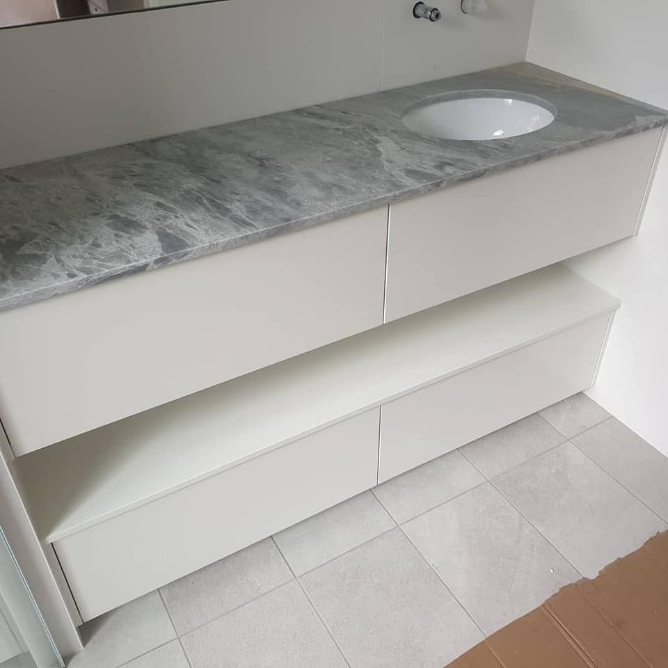 A Bathroom Vanity With a Sink and a Shelf — Pacific Cabinets In Yamba, NSW
