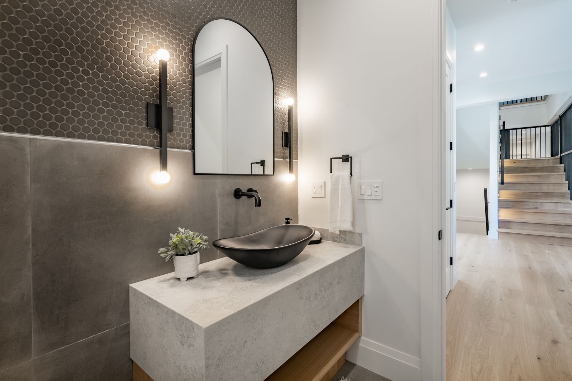 A Bathroom With a Sink , Mirror and Stairs — Pacific Cabinets In Grafton, NSW