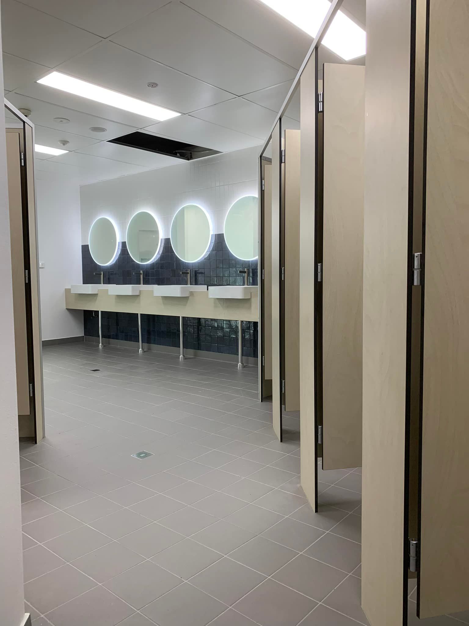A Bathroom With a Lot of Sinks and Mirrors — Pacific Cabinets In Yamba, NSW