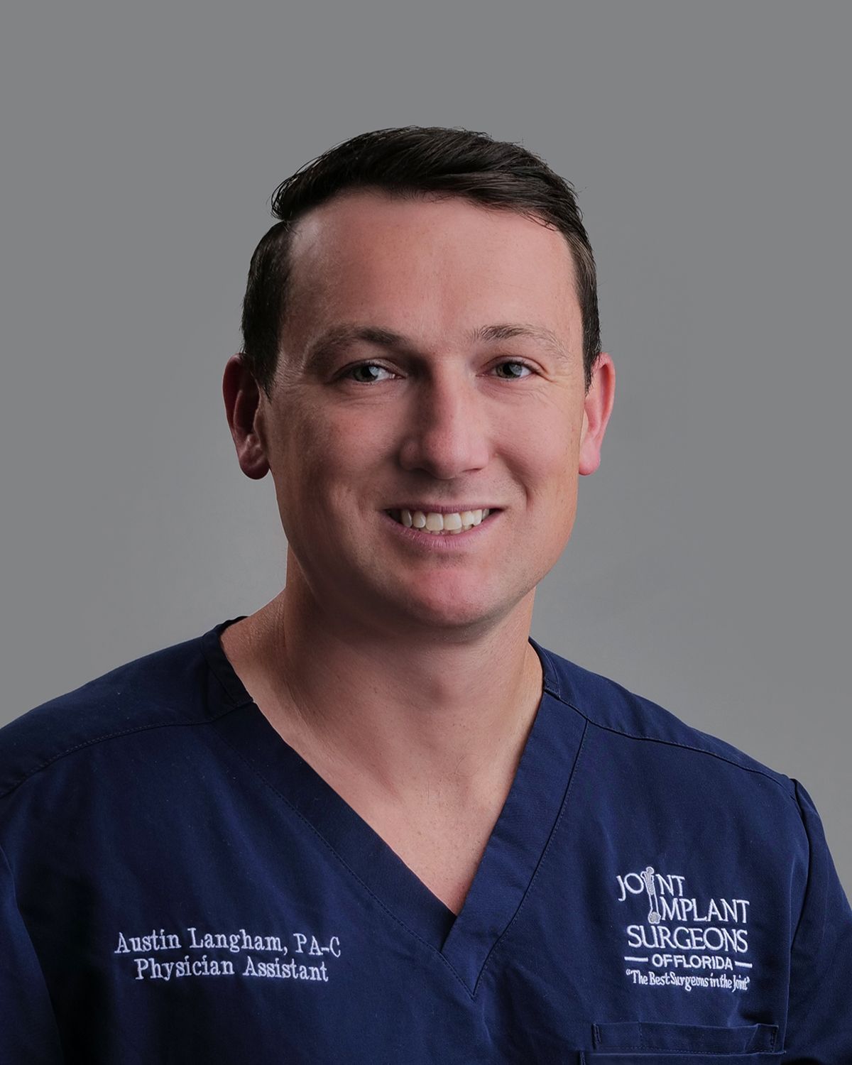 Smiling man in a black shirt with 