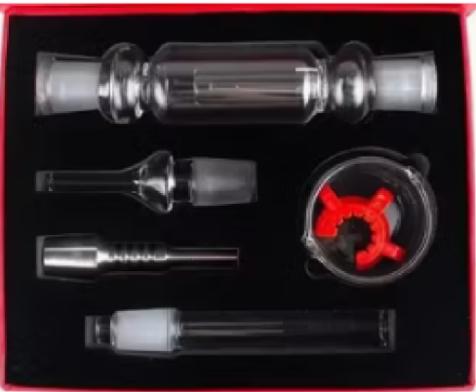 Red-lined box with a clear glass smoking pipe set and red mouthpiece tool on black background