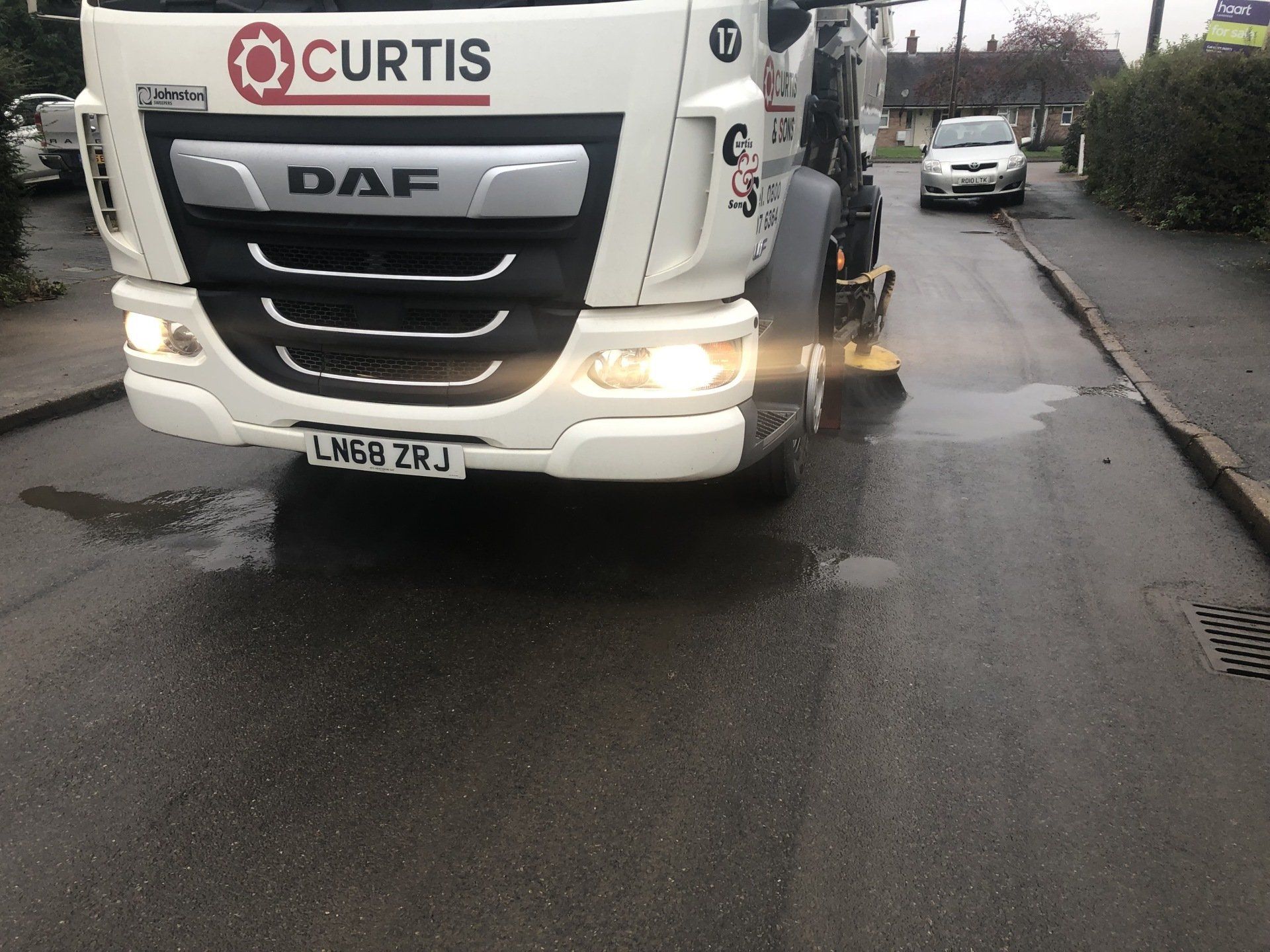 Close up of road sweeper
