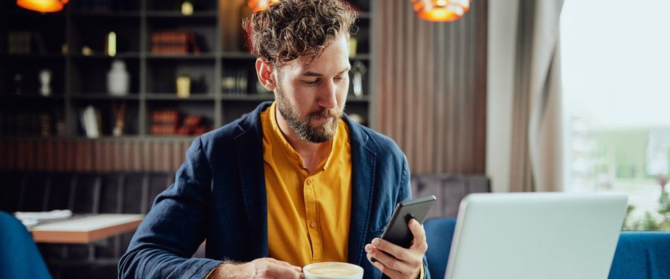 Businessman Drinking a Cup of Coffee — Fishers, IN — Norwood Economics