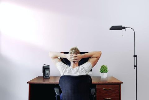 Man Sitting on his Working Area — Fishers, IN — Norwood Economics